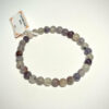 Bracelet en 6 mm en Tourmaline multi posé sur fond blanc